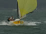 Missing link planeing to victory. Note the superb spinaker handling. Average winds that day were 25 Knts!