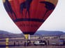 The balloon being filled up. 