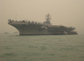 USS Ronald Reagan in the beaufitul Hong Kong air.