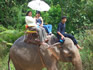 Janet and Mon (our house keeper for the holiday) Note Janet being treated to her own umbrella girl.