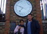 Janet and Simon by the meridian clock at Greenwich, London