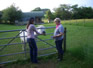 Janet and Jill feeding the pony in the paddock